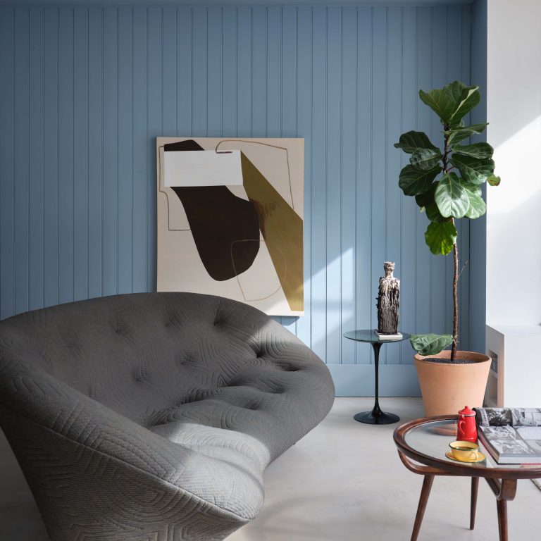 credit: props: sofa ligne roset. side table knoll,modern art hire